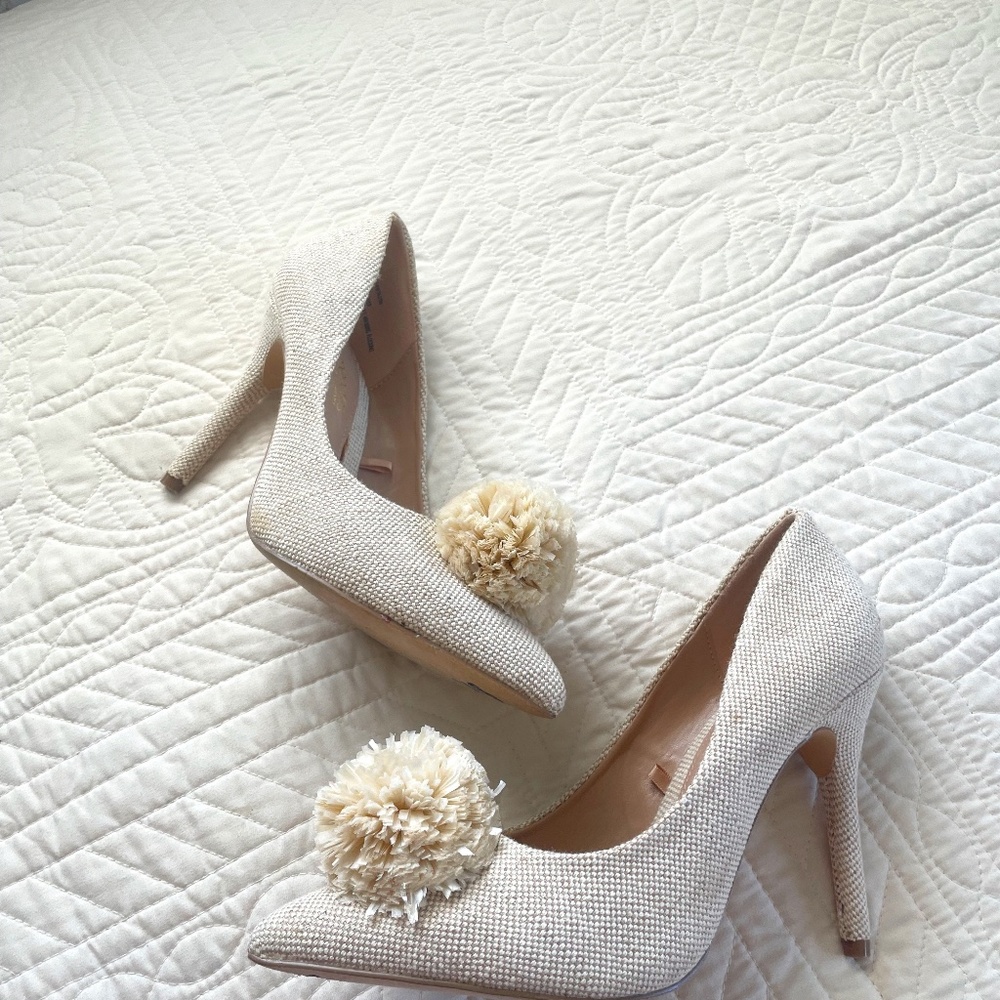Cream pompom pumps